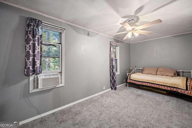 bedroom with ornamental molding, cooling unit, carpet, and ceiling fan