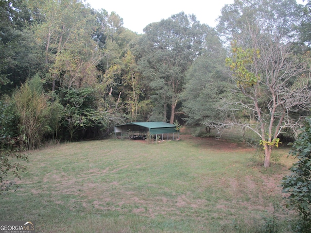 view of yard with a carport