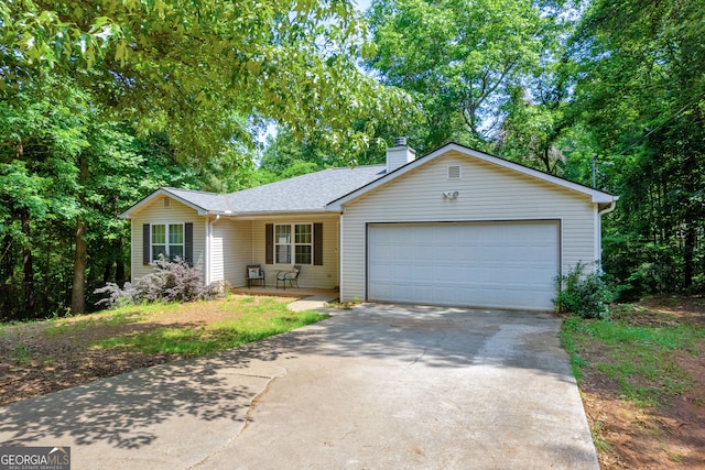 ranch-style house featuring a garage