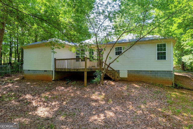 rear view of house with a deck