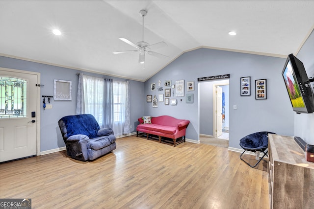 interior space with ceiling fan, light hardwood / wood-style flooring, and lofted ceiling