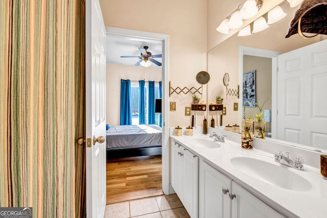 bathroom featuring tile patterned floors, ceiling fan, and vanity