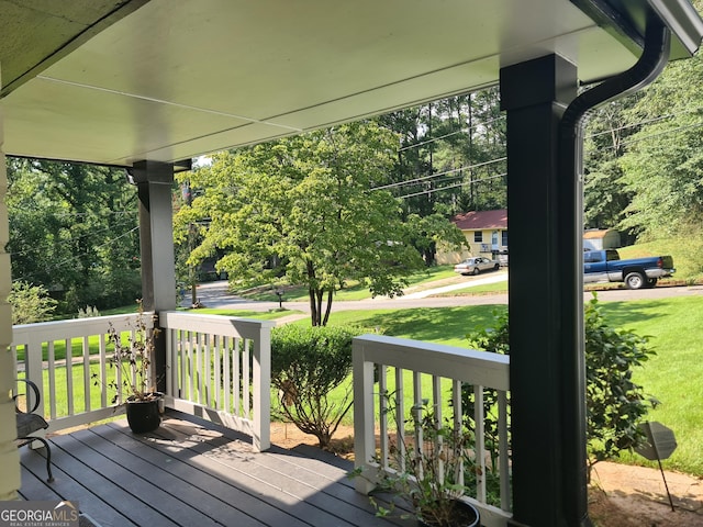 wooden deck featuring a porch