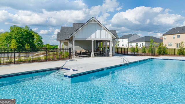 view of pool with a patio area