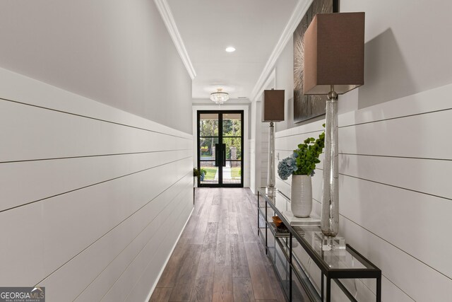 hallway with recessed lighting, wood finished floors, and ornamental molding