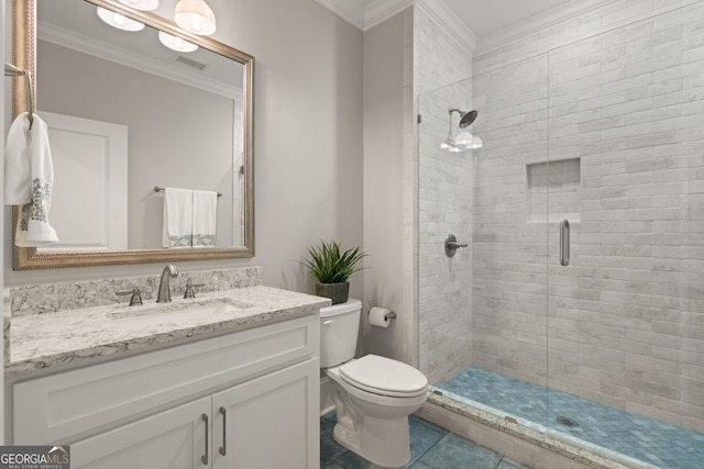 bathroom featuring tile patterned flooring, ornamental molding, vanity, walk in shower, and toilet