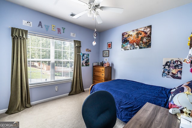 carpeted bedroom with ceiling fan