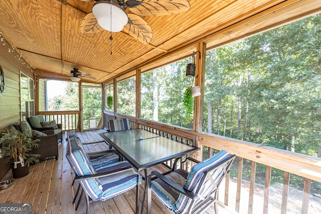 sunroom with wooden ceiling