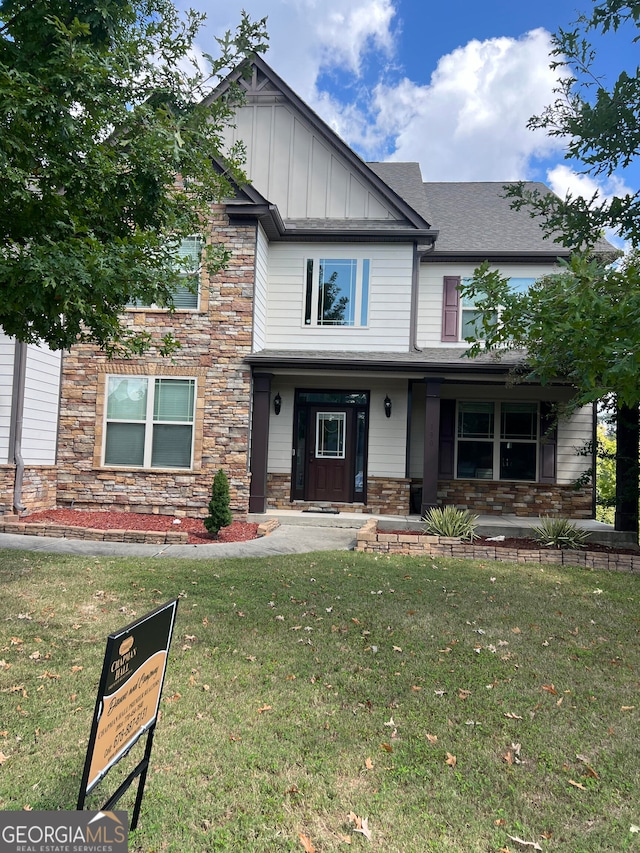 view of front of house featuring a front lawn