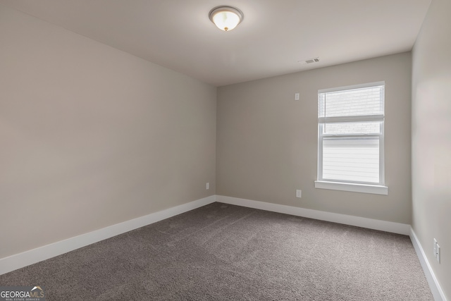 view of carpeted spare room