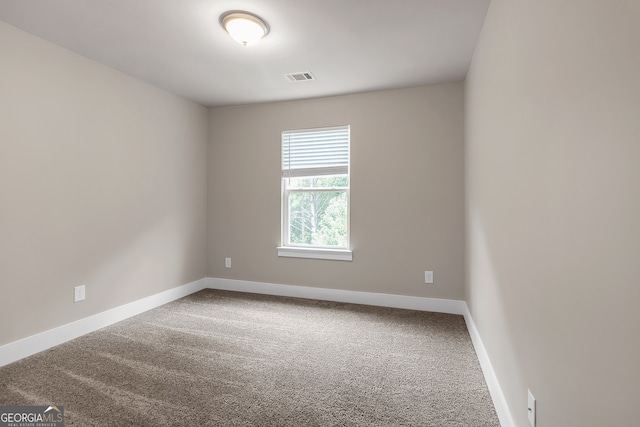 view of carpeted spare room