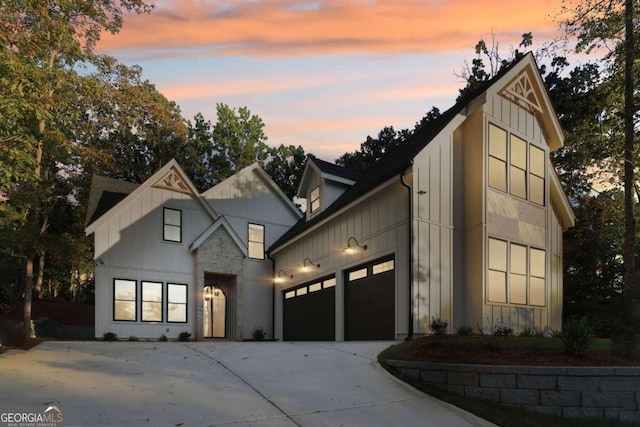 modern farmhouse featuring a garage