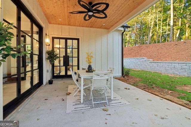 view of patio / terrace featuring ceiling fan and french doors