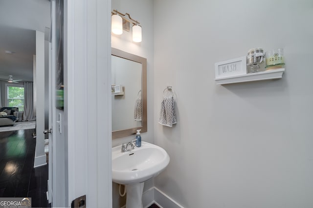 bathroom featuring hardwood / wood-style flooring and sink