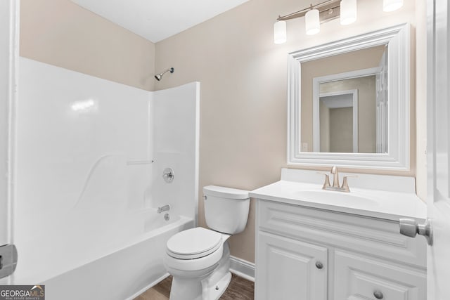 full bathroom with bathing tub / shower combination, vanity, toilet, and wood-type flooring