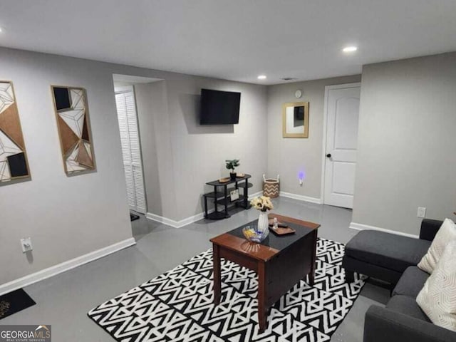 living room featuring concrete floors