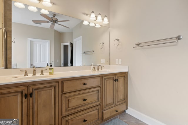 bathroom featuring tile patterned flooring, ceiling fan, and vanity