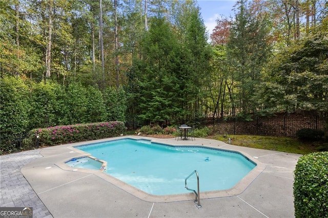 view of pool with a patio area