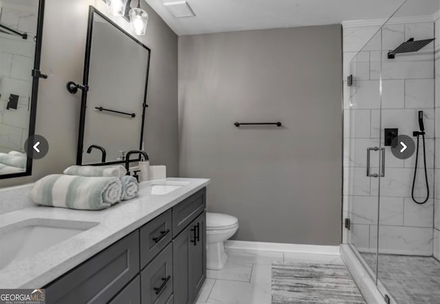 bathroom featuring walk in shower, vanity, and toilet