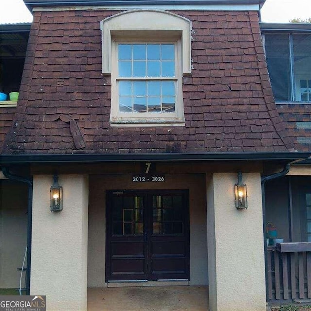 property entrance with french doors