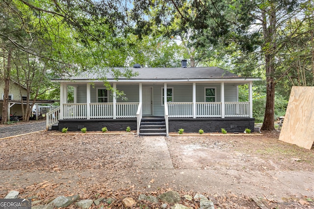 view of front of home featuring covered porch