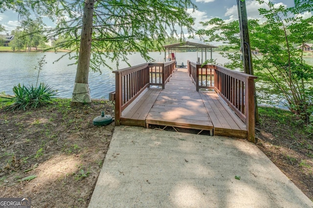 dock area with a water view