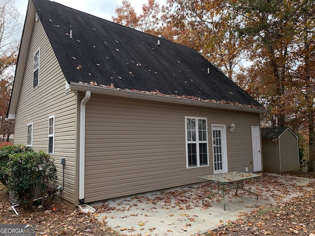 back of property with a patio area