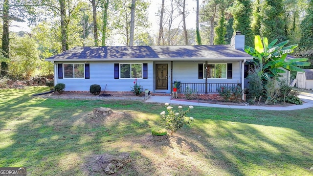 single story home featuring a front yard and covered porch