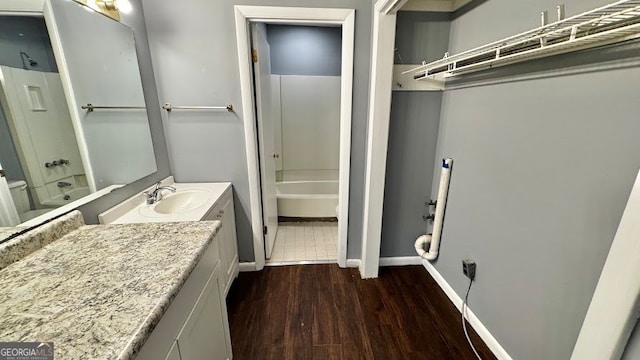 bathroom featuring vanity and hardwood / wood-style flooring