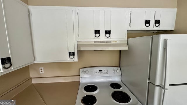 kitchen featuring white cabinets and white electric range