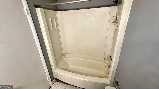 bathroom with shower / tub combination and tile patterned floors