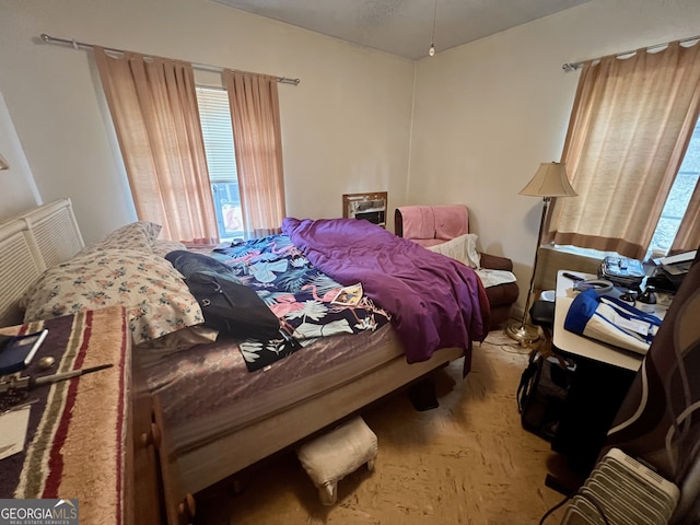 bedroom featuring light wood-type flooring