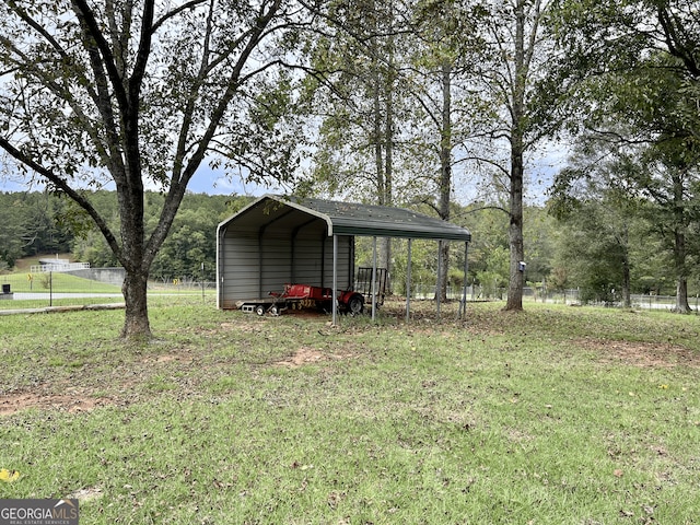 view of yard with a carport