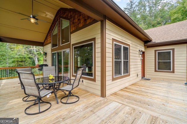 wooden terrace featuring ceiling fan