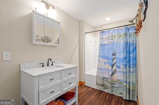292 Silver Fox Trl, Blue Ridge, GA 30513 - bathroom with wood finished floors, vanity, and shower / bath combo
