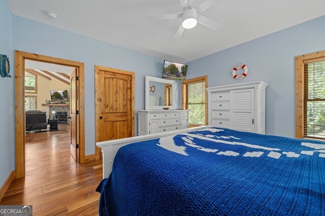 292 Silver Fox Trl, Blue Ridge, GA 30513 - bedroom with wood finished floors, baseboards, and ceiling fan