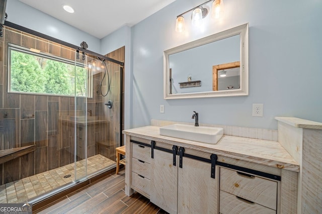 292 Silver Fox Trl, Blue Ridge, GA 30513 - bathroom featuring a stall shower, vanity, wood finish floors, and recessed lighting