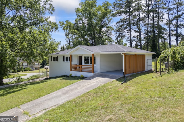 ranch-style home with a front yard and a carport