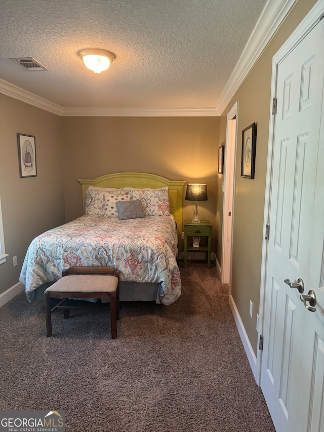 bedroom featuring dark carpet, a textured ceiling, and ornamental molding