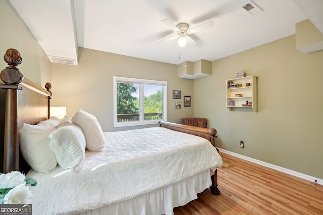 bedroom featuring ceiling fan and hardwood / wood-style floors