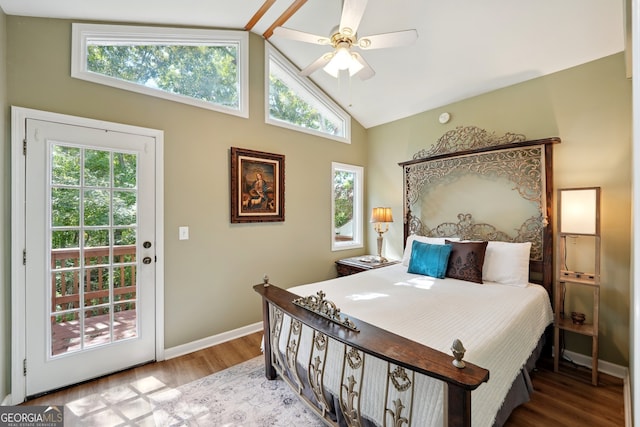 bedroom with ceiling fan, multiple windows, and access to outside