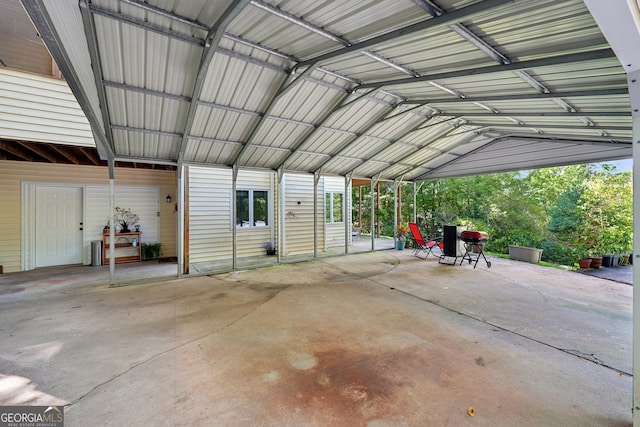 garage featuring a carport