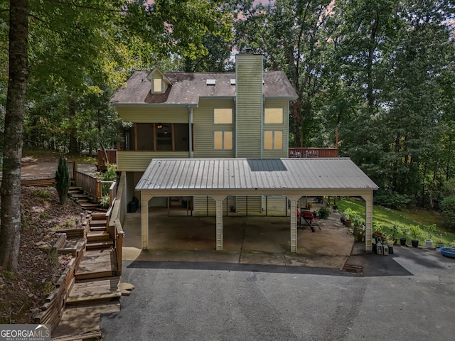 rear view of house featuring a patio area