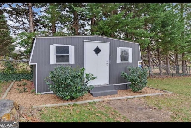 view of outdoor structure with a yard