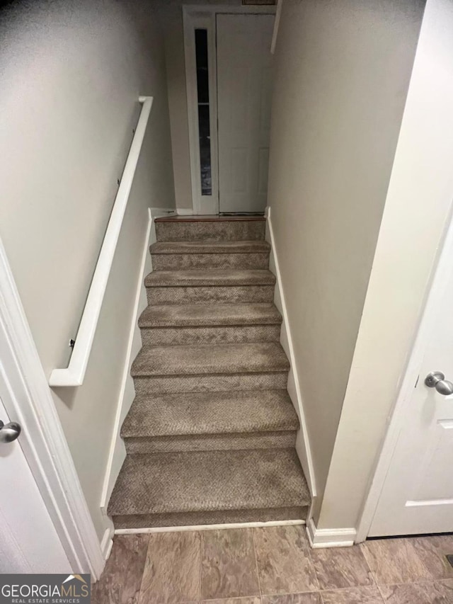 3364 Joseph Dr NW, Acworth, GA 30101 - stairs with baseboards