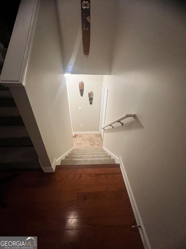 3364 Joseph Dr NW, Acworth, GA 30101 - stairway featuring baseboards and wood finished floors