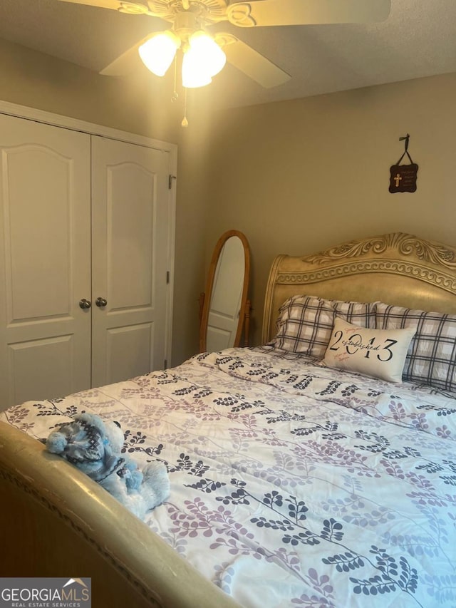 3364 Joseph Dr NW, Acworth, GA 30101 - bedroom featuring a closet and ceiling fan
