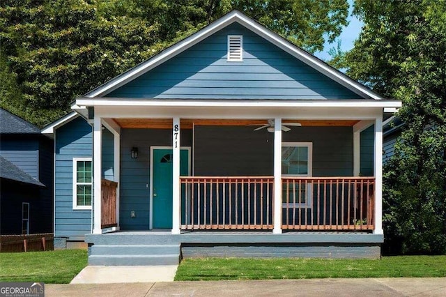 bungalow with covered porch and ceiling fan