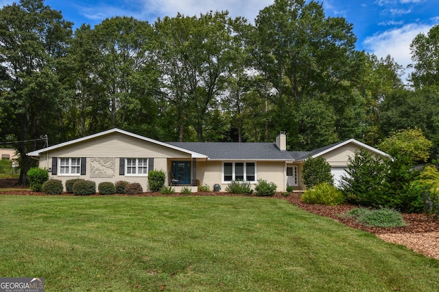 ranch-style home with a front yard