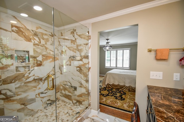 bathroom featuring ornamental molding and a shower with door